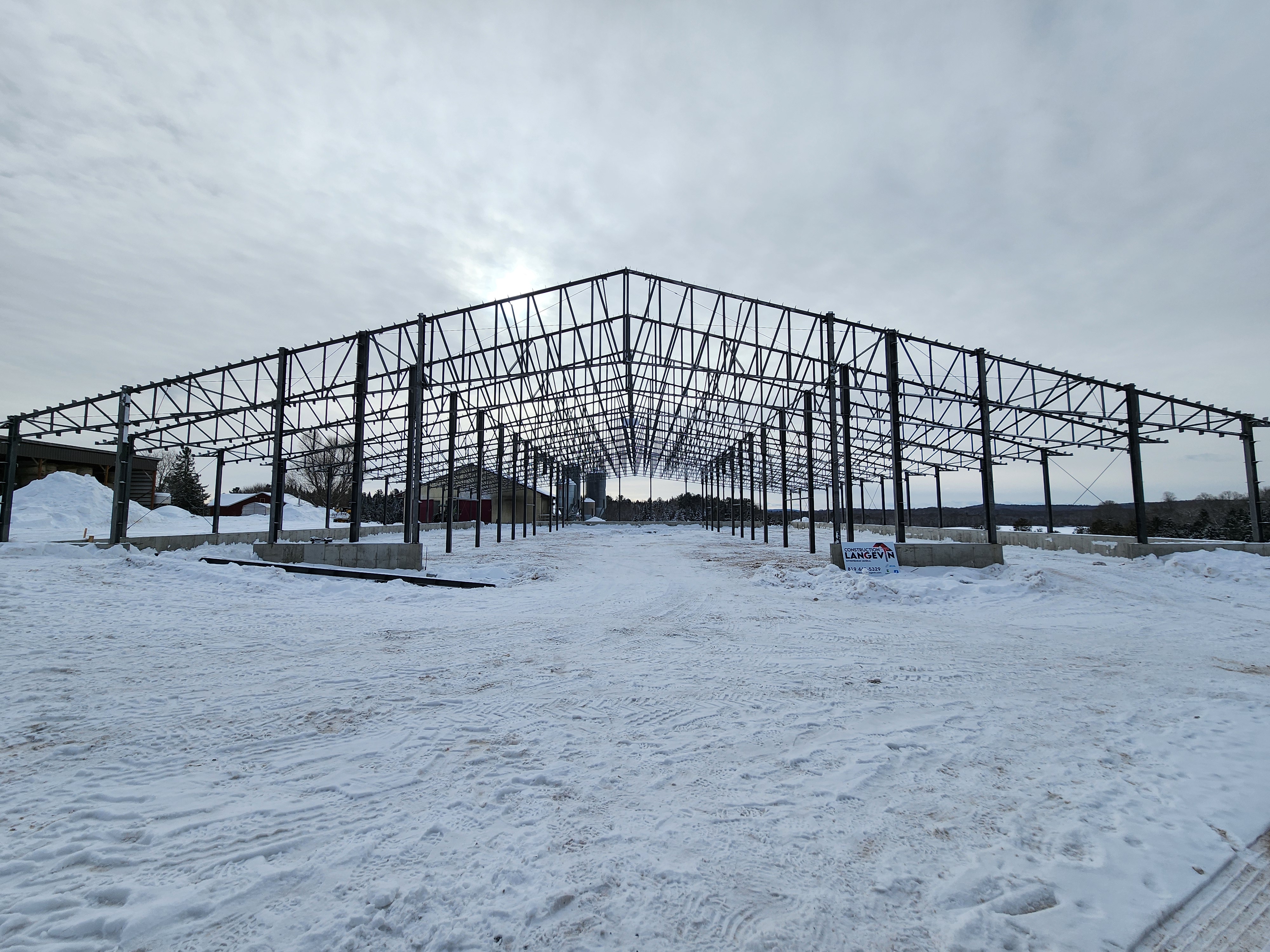 Charpente de bois et d'acier par Construction Langevin